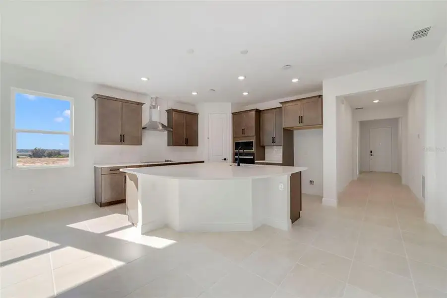 Furnished interior view inside a new home in Vintner Reserve, Clermont (Image 6).