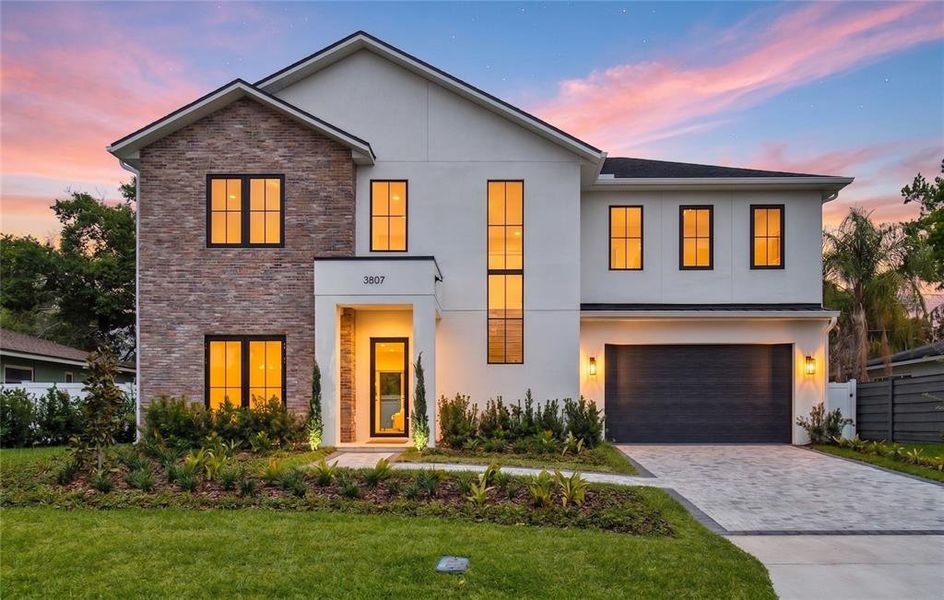 Front exterior of a new home in , Orlando, FL, highlighting curb appeal (Image 28).