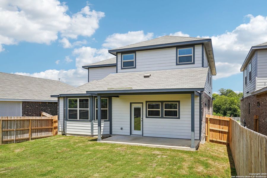 Front exterior of a new home in Comanche Ridge, San Antonio, TX, highlighting curb appeal (Image 1). Front exterior of a new home in Comanche Ridge, San Antonio, TX, highlighting curb appeal (Image 1).