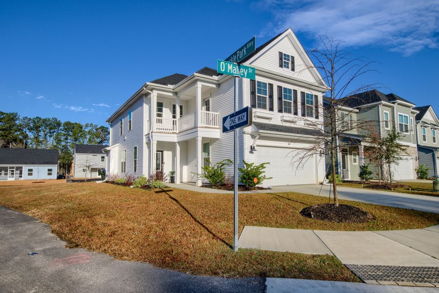 Front exterior of a new home in Six Oaks, Summerville, SC, highlighting curb appeal (Image 26). Front exterior of a new home in Six Oaks, Summerville, SC, highlighting curb appeal (Image 26).