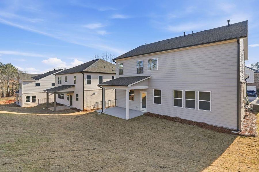 Exterior details and patio area of a home in Auburn Glen, Dacula (Image 23).