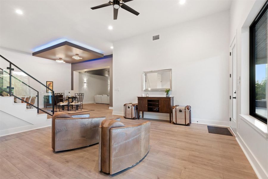 Designed for unforgettable entertaining, the lower level features a barrel-ceiling home theater, expansive game room, stylish bar, and temperature-controlled wine cellar.