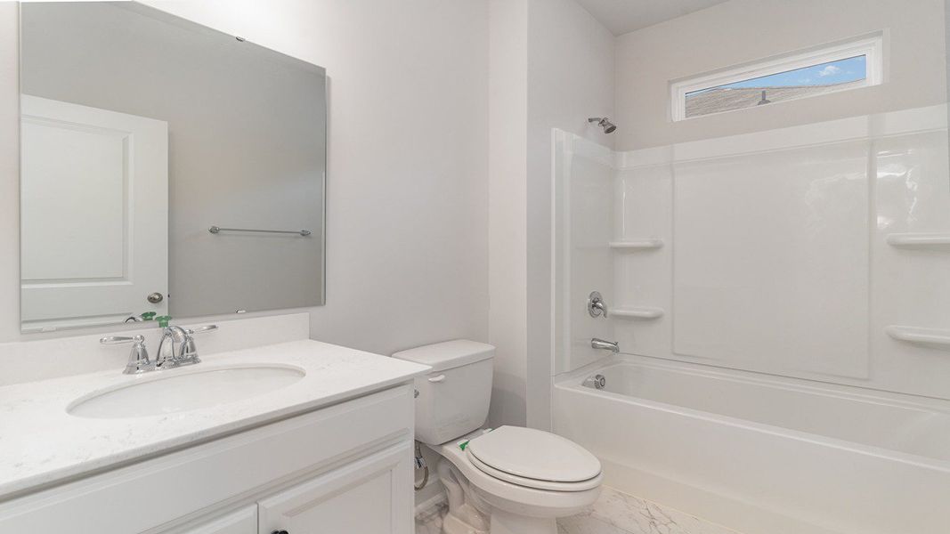 Representative furnished interior of a home built from the DARBY by D.R. Horton in Waterbridge, Myrtle Beach (Image 6).