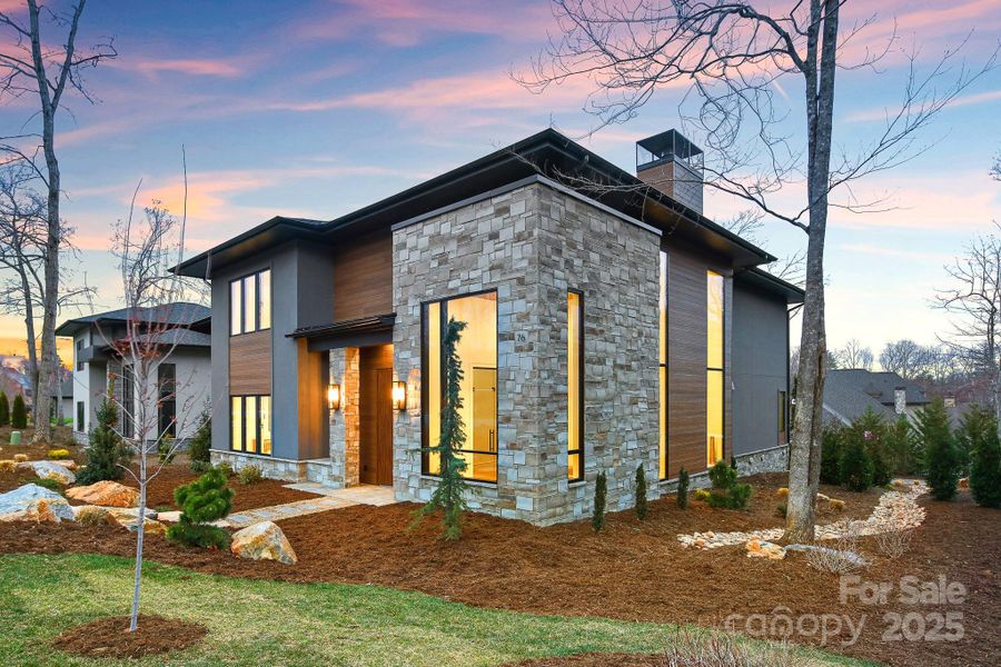 Front exterior of a new home in , Arden, NC, highlighting curb appeal (Image 22).