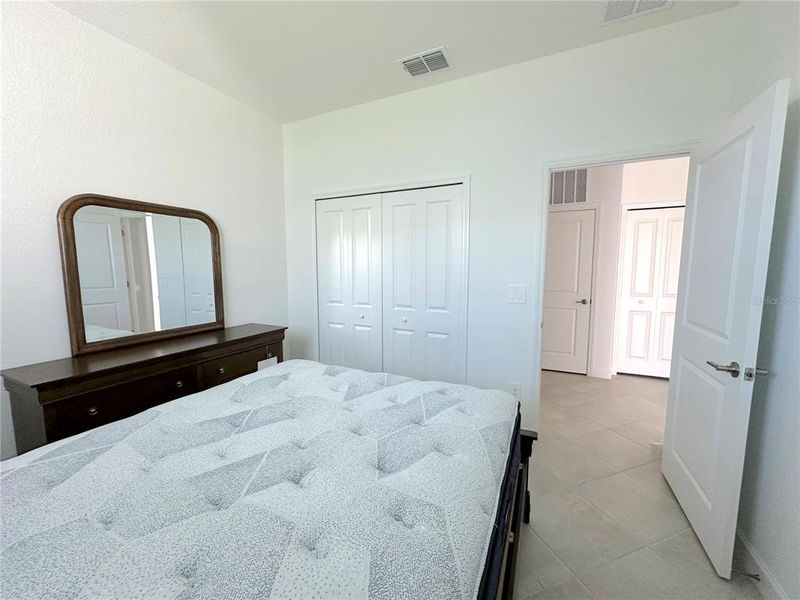 Furnished interior view inside a new home in Palm Lake at Coco Bay, Englewood (Image 11).