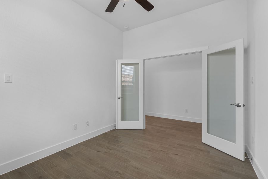 Representative unfurnished interior of a home built from the Adele by Chesmar Homes in Sunterra, Katy (Image 10).