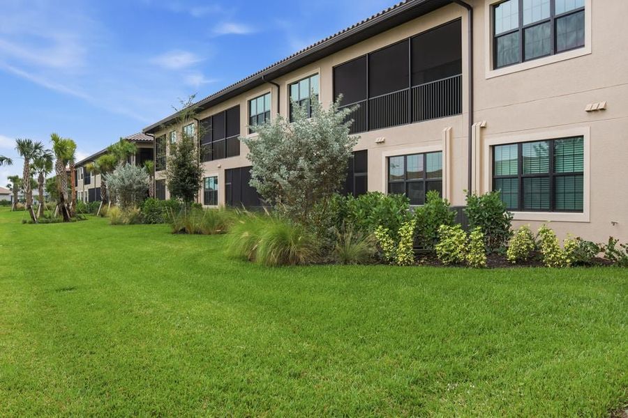 Exterior details and patio area of a home in Esplanade by the Islands Coach Homes, Naples (Image 3).