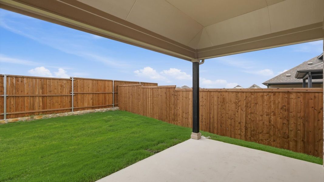Exterior details and patio area of a home in Westridge Journey, Princeton (Image 4).