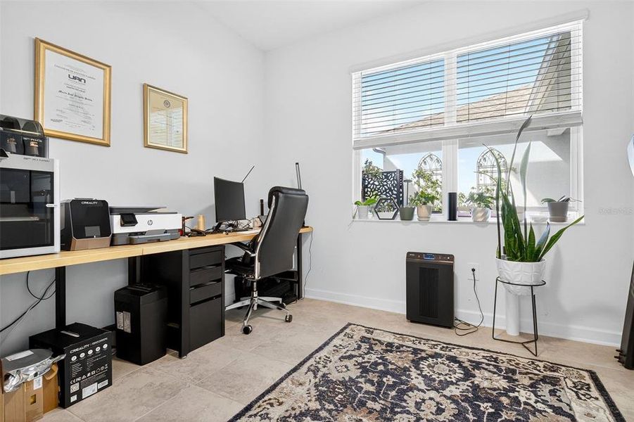 Furnished interior view inside a new home in Storey Park: Innovation Cottage Collection, Orlando (Image 6).