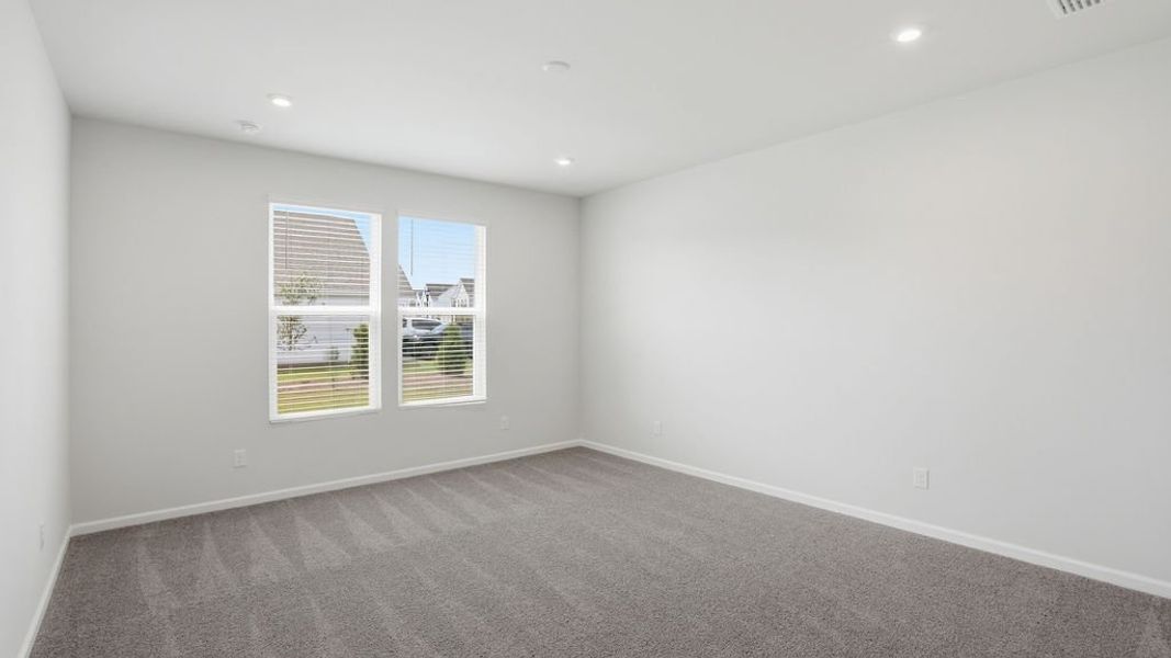 Spacious, unfurnished interior of a new home in Midpoint at New Riverside, Bluffton (Image 21).