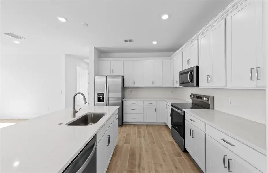 Furnished interior view inside a new home in Legacy Groves, Nokomis (Image 4).