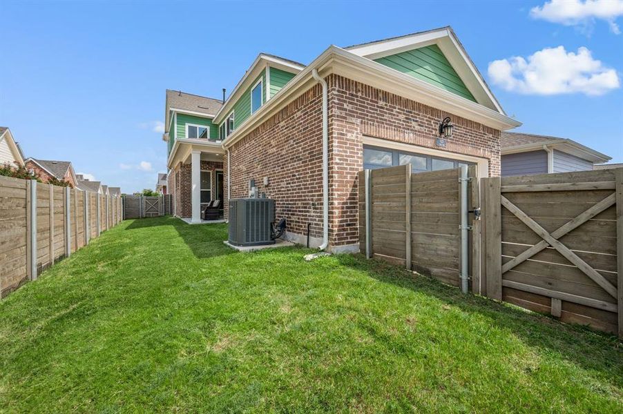 Front exterior of a new home in HomeTown Garden, North Richland Hills, TX, highlighting curb appeal (Image 2). Front exterior of a new home in HomeTown Garden, North Richland Hills, TX, highlighting curb appeal (Image 2).
