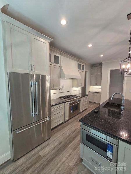 Furnished interior view inside a new home in , Belmont (Image 30).