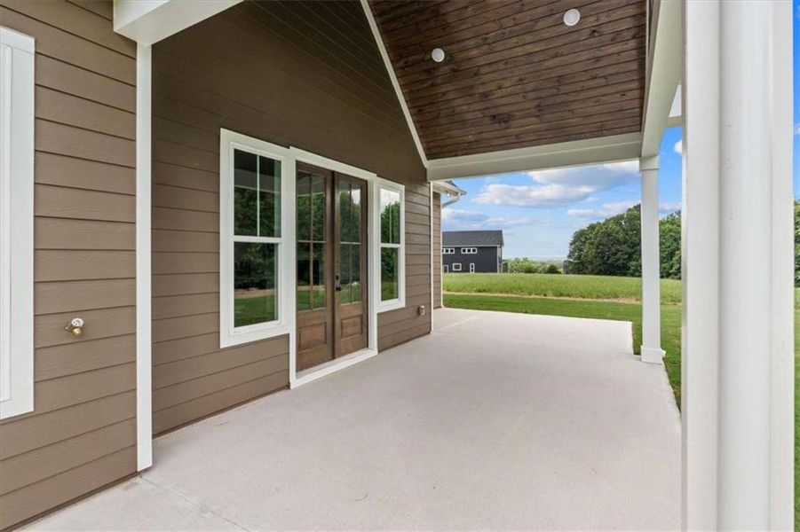 Exterior details and patio area of a home in , Roopville (Image 34).