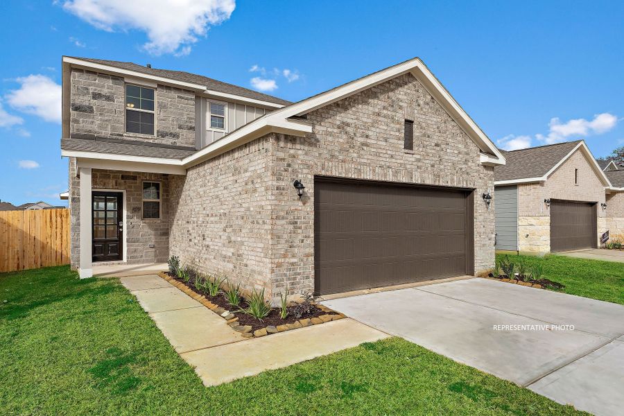 A stone house with a garage. A stone house with a garage.