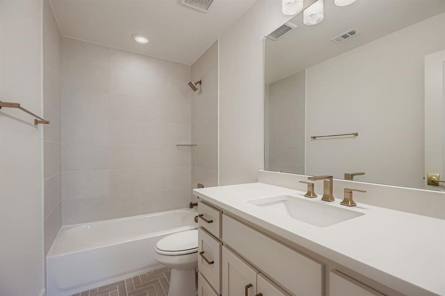 Furnished interior view inside a new home in , The Colony (Image 11).