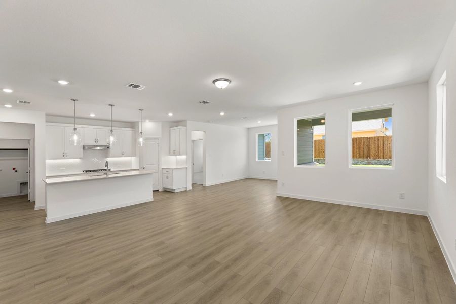 Open Kitchen-Living-Dining Room featuring the Timeless Collection