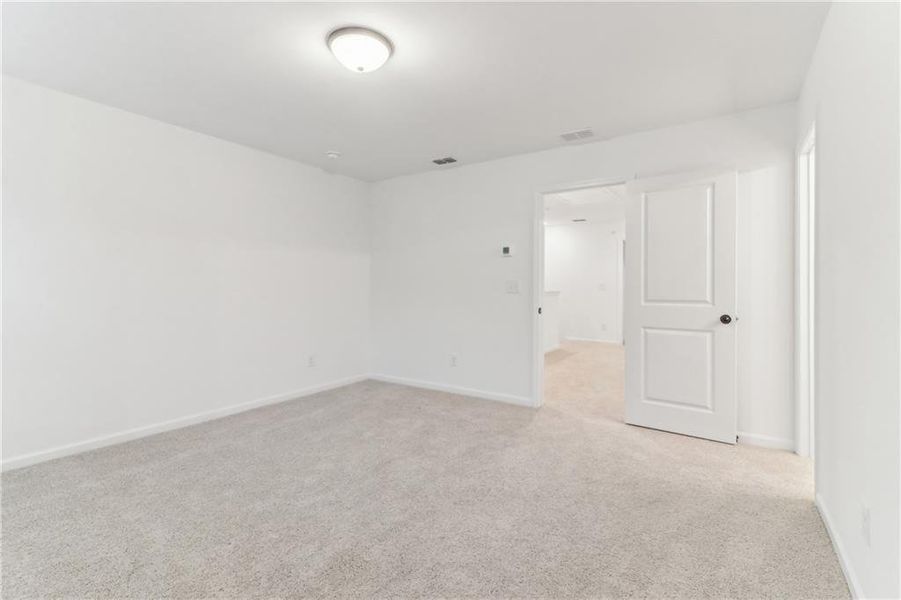 Spacious, unfurnished interior of a new home in Laurelwood, Douglasville (Image 24).