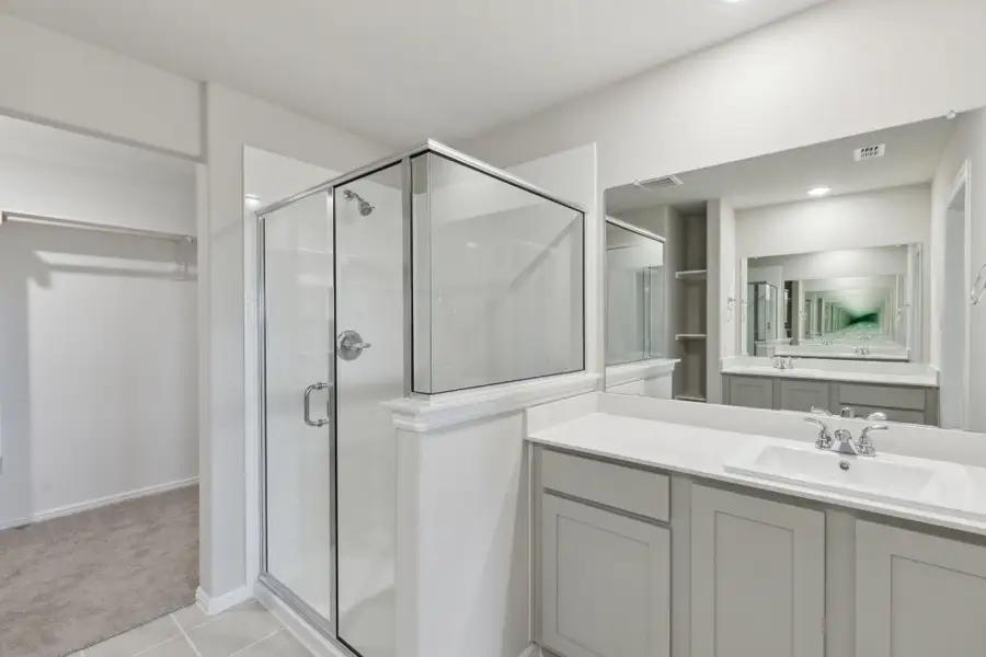 Primary Bathroom in the Harrison home plan by Trophy Signature Homes – REPRESENTATIVE PHOTO Primary Bathroom in the Harrison home plan by Trophy Signature Homes – REPRESENTATIVE PHOTO