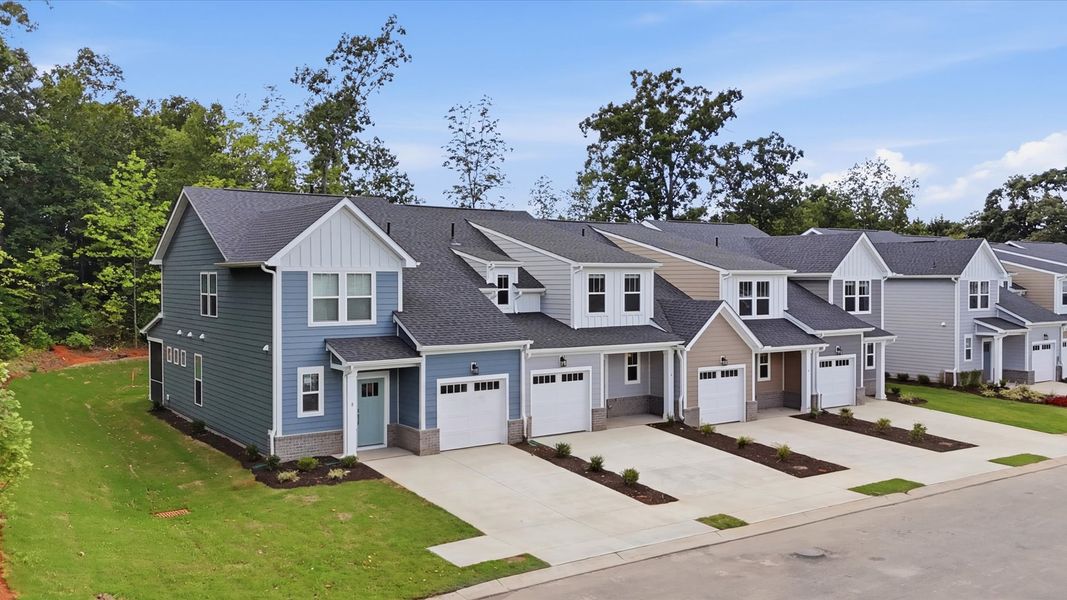 Front exterior of a new home in Pelham Crossing Villas, Greenville, SC, highlighting curb appeal (Image 22). Front exterior of a new home in Pelham Crossing Villas, Greenville, SC, highlighting curb appeal (Image 22).