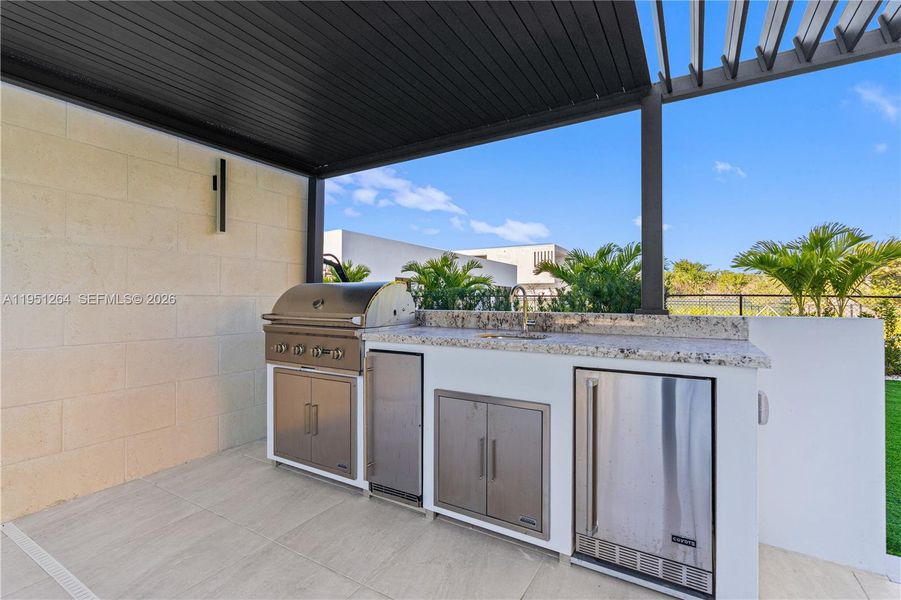 Exterior details and patio area of a home in , Weston (Image 27).