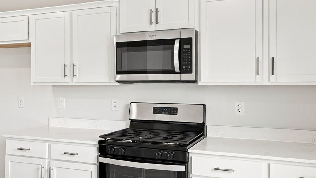 Furnished interior view inside a new home in Lakestone, Woodruff (Image 9).