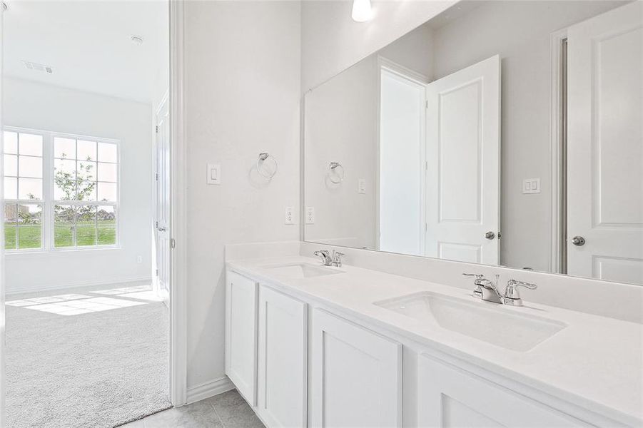 Bathroom featuring vanity