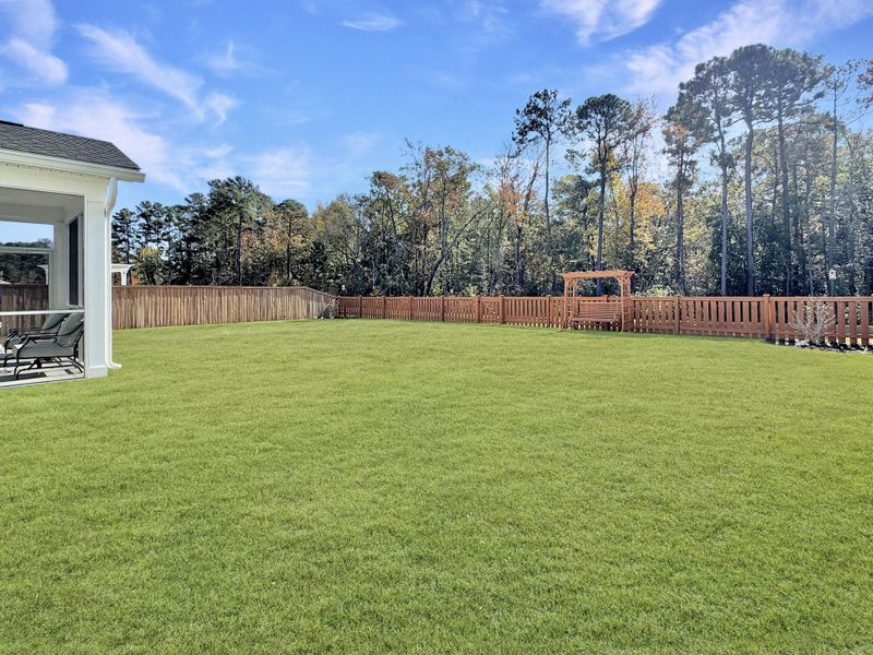 Exterior details and patio area of a home in Hewing Farms, Summerville (Image 27). Exterior details and patio area of a home in Hewing Farms, Summerville (Image 27).