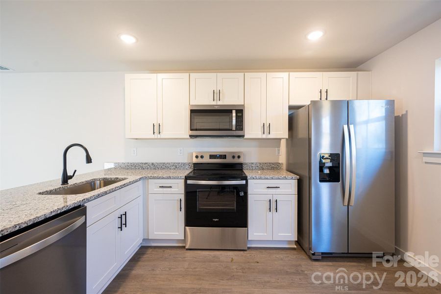 Furnished interior view inside a new home in , Hickory (Image 5).