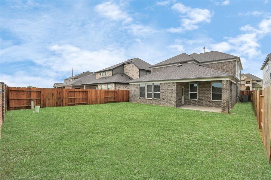 Explore the expansive backyard with its inviting covered patio—a perfect blend of space for the kids to play and adults to unwind. Ideal for creating your outdoor oasis, this backyard accommodates patio furniture, a BBQ pit, and endless possibilities for leisure and entertainment.