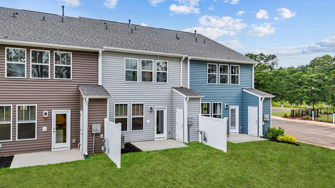 Two story townhome with large windows at Ransdell Pointe by DRB Homes in Spartanburg, SC