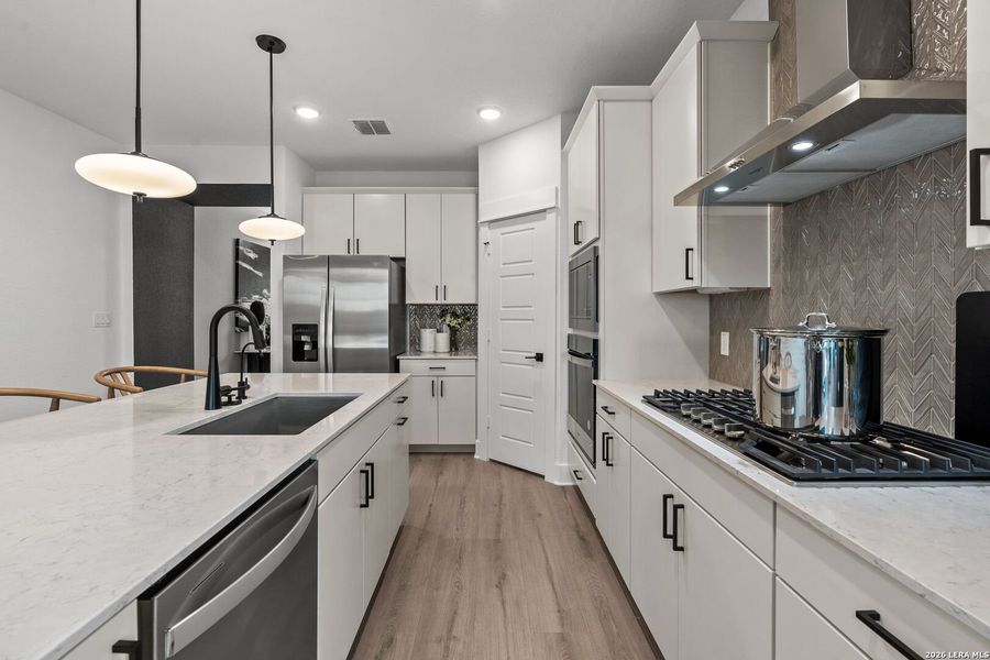 Furnished interior view inside a new home in Bison Ridge, San Antonio (Image 23). Furnished interior view inside a new home in Bison Ridge, San Antonio (Image 23).