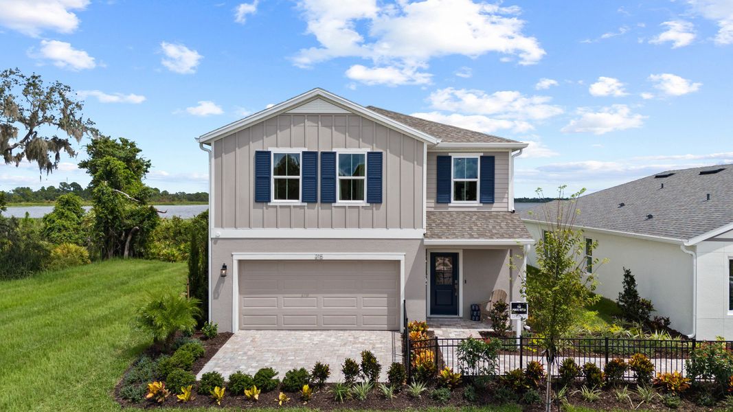 Representative exterior photo of a completed home built from the Ponte Verde by DRB Homes in Willowbrook North, Winter Haven, FL (Image 30). Representative exterior photo of a completed home built from the Ponte Verde by DRB Homes in Willowbrook North, Winter Haven, FL (Image 30).