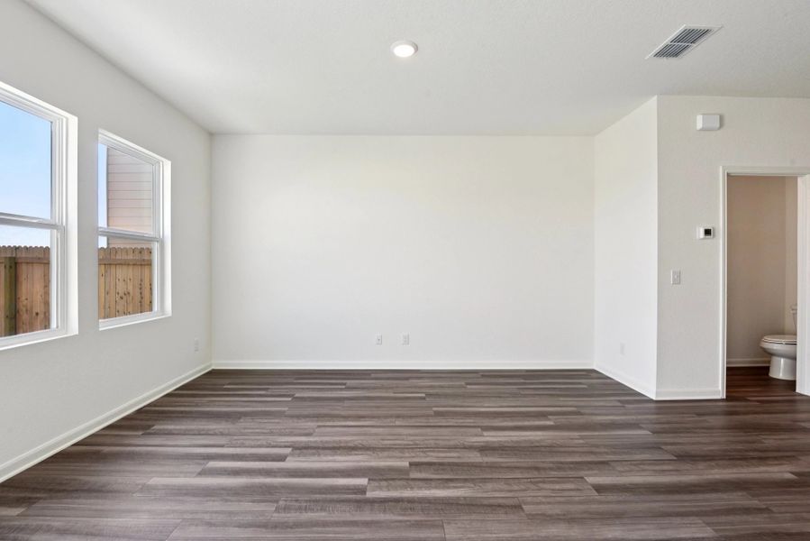 Representative unfurnished interior of a home built from the Compass by Starlight Homes in The Wilder, Adkins (Image 17).