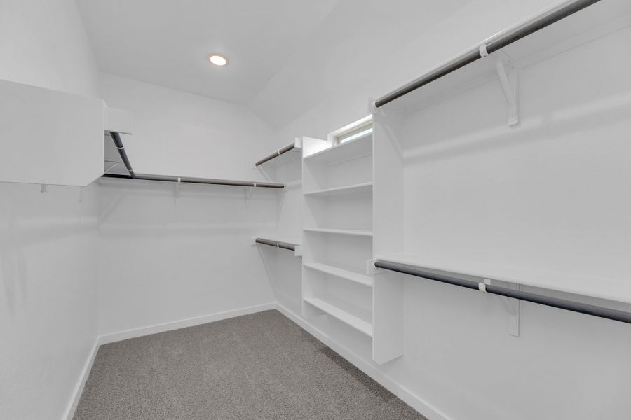 Primary Closet in the Evelyn Pecos model home in Austin TX by Trophy Signature Homes