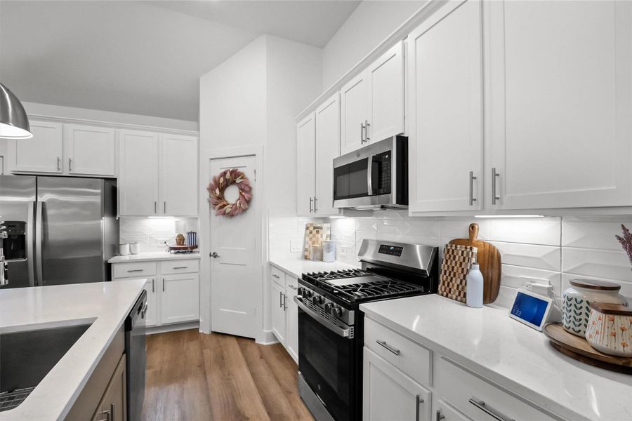Furnished interior view inside a new home in Lone Star Landing, Montgomery (Image 7).