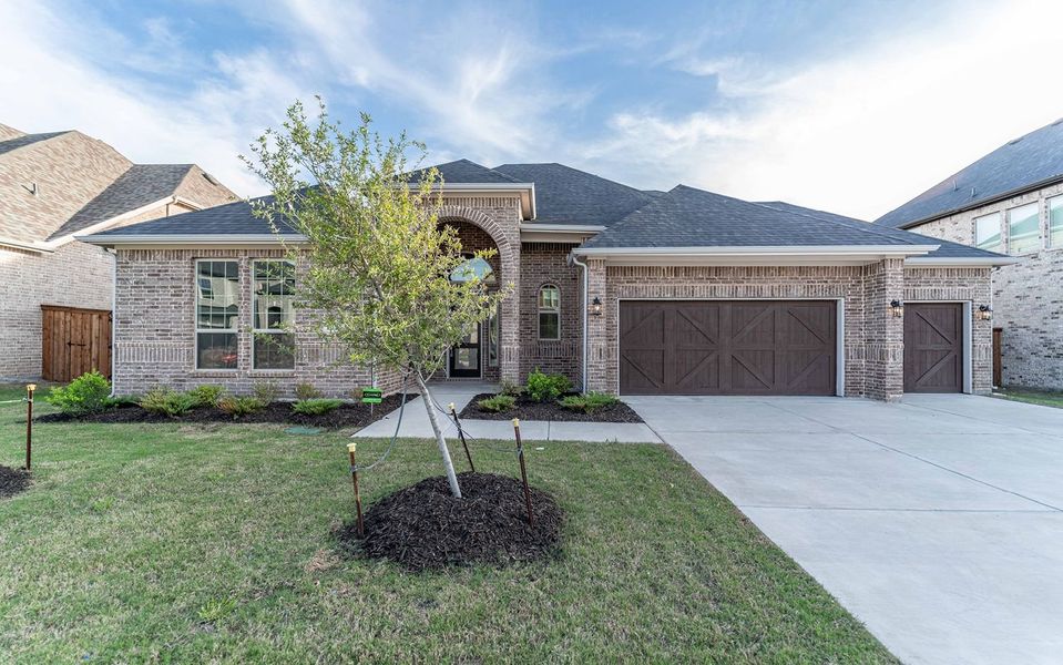 Front exterior of a new home in Sonoma Verde, Rockwall, TX, highlighting curb appeal (Image 1). Front exterior of a new home in Sonoma Verde, Rockwall, TX, highlighting curb appeal (Image 1).