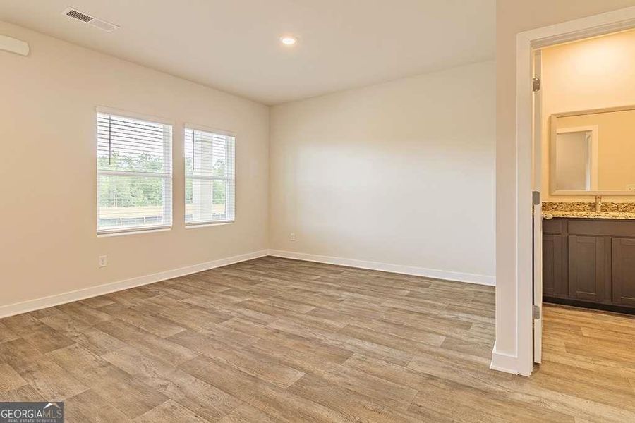 Spacious, unfurnished interior of a new home in Fern Dale, Fairburn (Image 14).