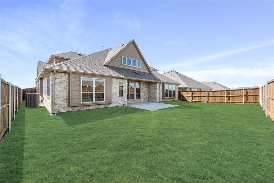 Exterior details and patio area of a home in Stone River Glen 60s, Royse City (Image 3). Exterior details and patio area of a home in Stone River Glen 60s, Royse City (Image 3).