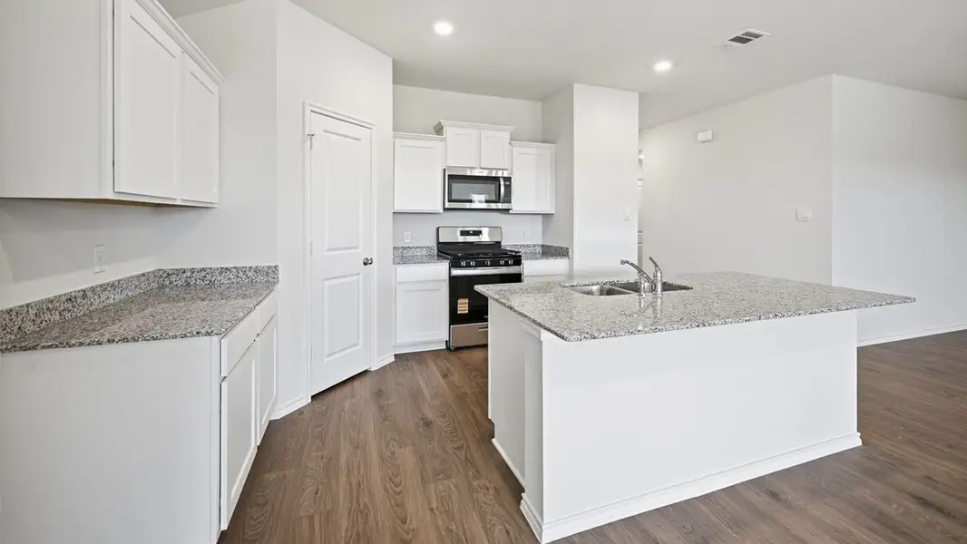 Furnished interior view inside a new home in Windrose, Pilot Point (Image 3).