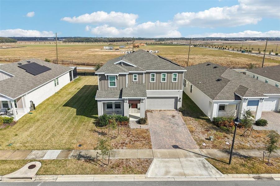 Front exterior of a new home in , Apopka, FL, highlighting curb appeal (Image 23).