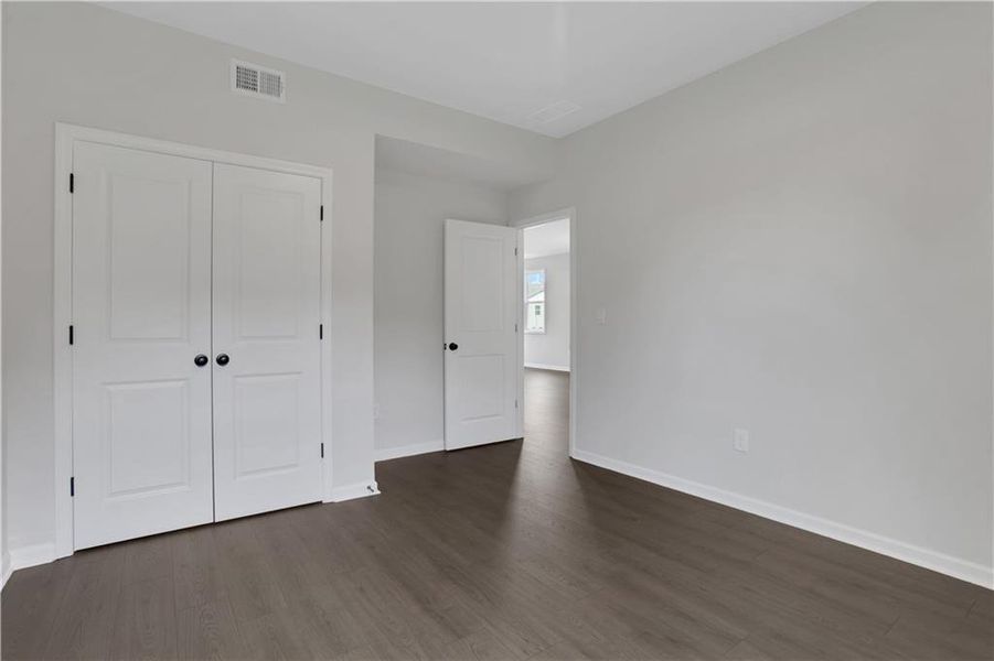 Spacious, unfurnished interior of a new home in The Paddocks at Doc Hughes, Buford (Image 20). Spacious, unfurnished interior of a new home in The Paddocks at Doc Hughes, Buford (Image 20).