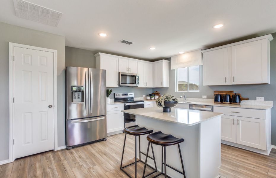 Open concept kitchen with eat-in island