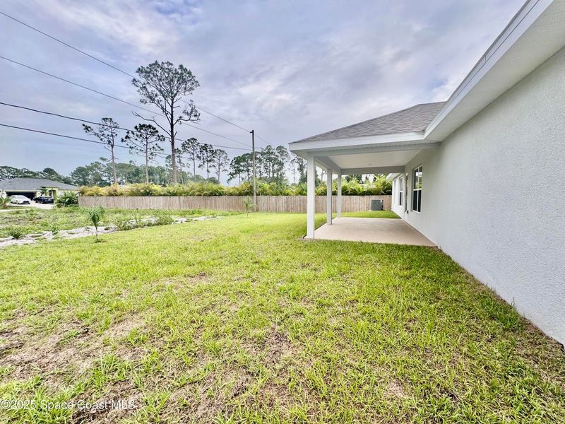 Exterior details and patio area of a home in Palm Bay, Palm Bay (Image 3).