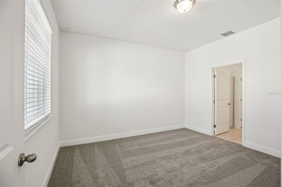 Spacious, unfurnished interior of a new home in Cyrene at Minneola - Villas, Minneola (Image 27).