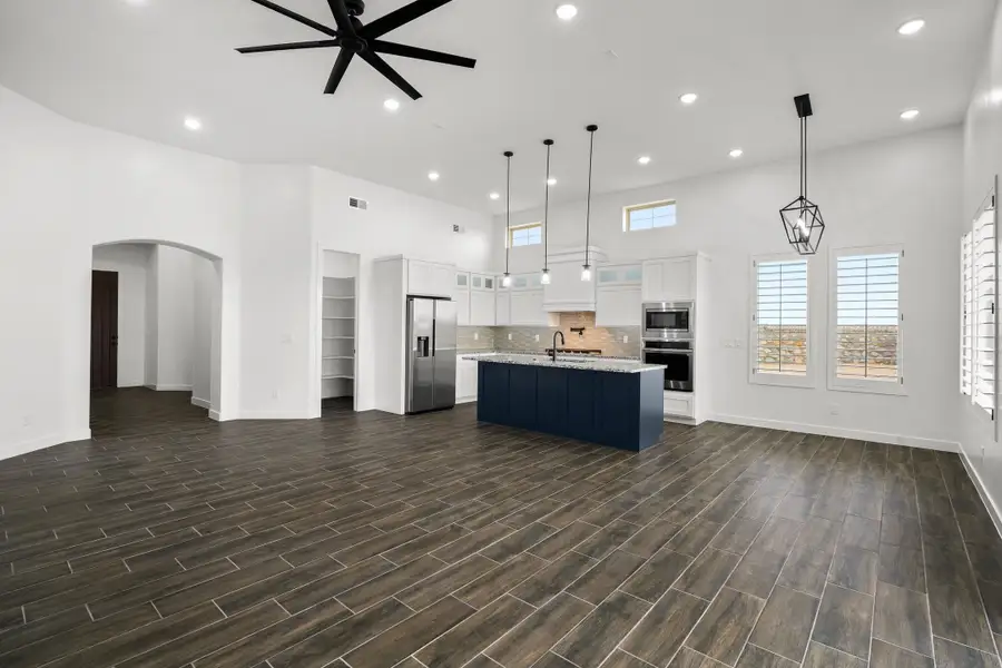 Representative furnished interior of a home built from the Scottsdale by LEH. Homes in Verdancia, El Paso (Image 8).
