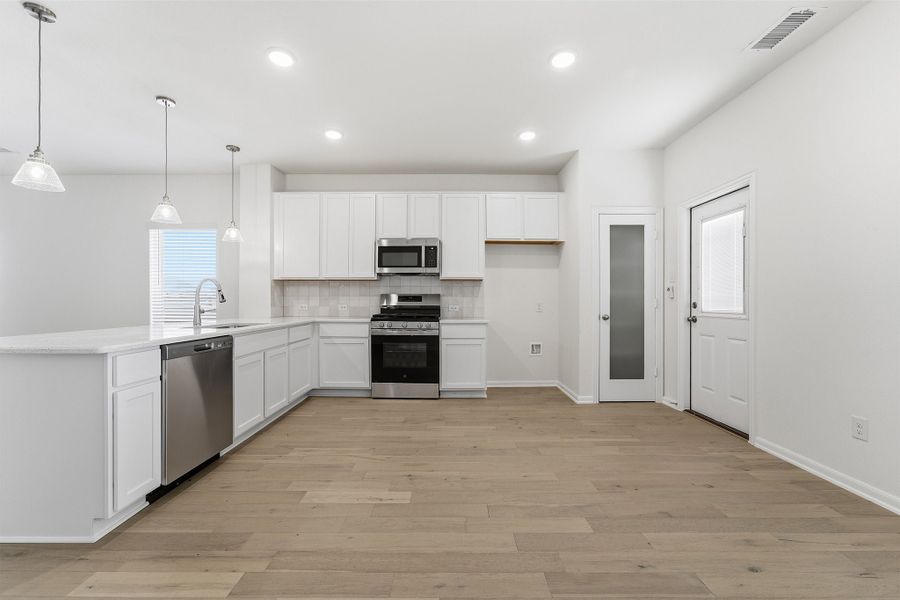 Furnished interior view inside a new home in Pebblebrook, Sherman (Image 7).