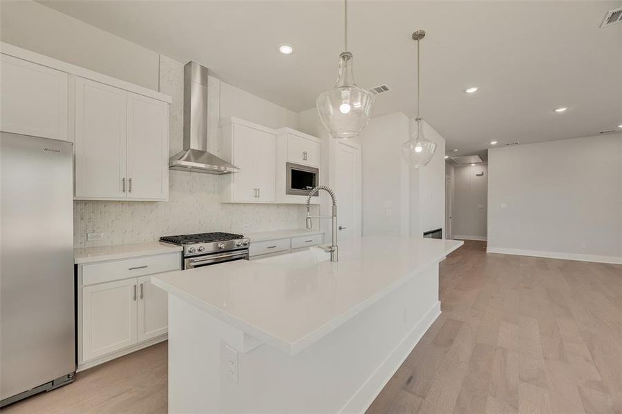 Furnished interior view inside a new home in Collin Creek, Plano (Image 8).