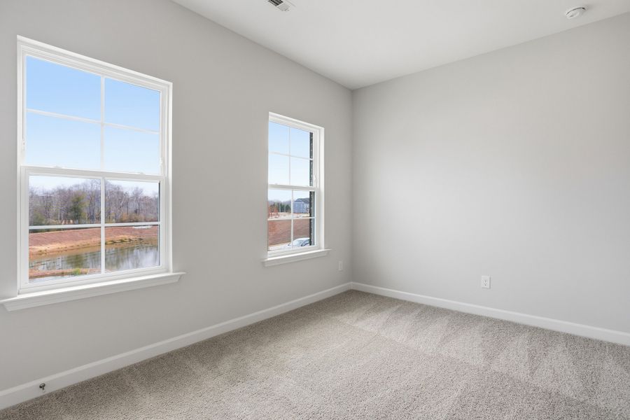 Spacious, unfurnished interior of a new home in Renaissance at White Oak, Garner (Image 28).