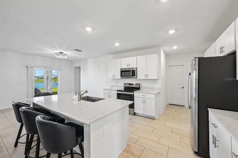 Furnished interior view inside a new home in Seaire, Parrish (Image 17).